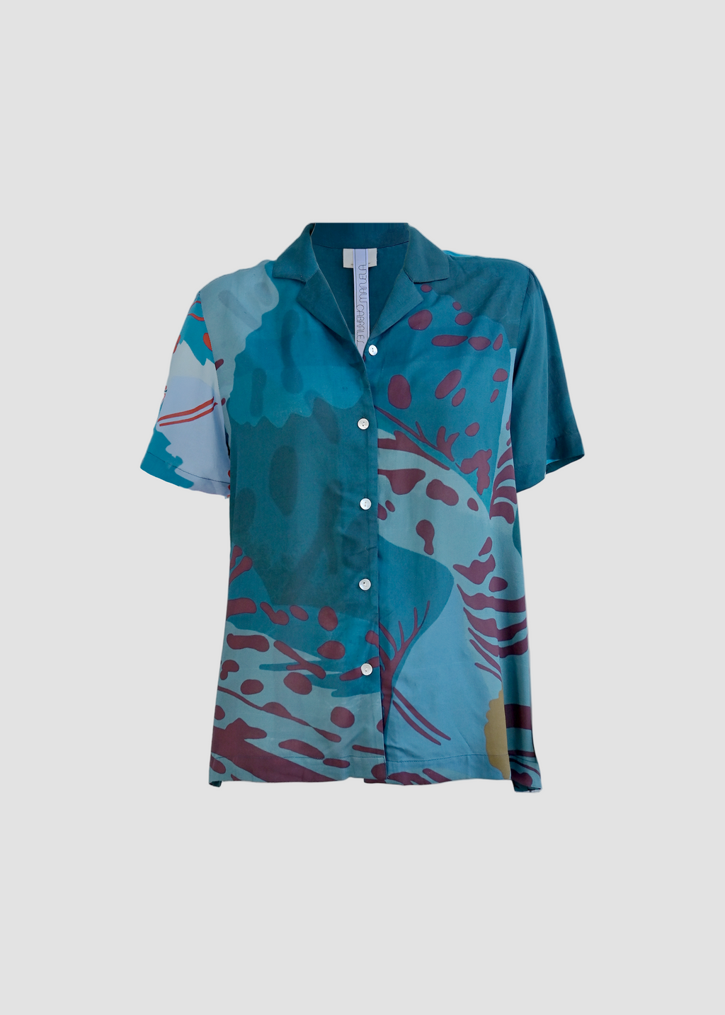 Blue patterned shirt on a white background